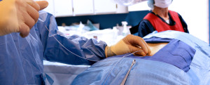 Dr. Michael A. Castillo doing trial implant procedure in office