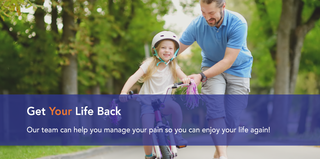 Dr. Castillo and his team can help you better manage your pain so you can get back to living life. Man teaching young daughter to ride bike, image.